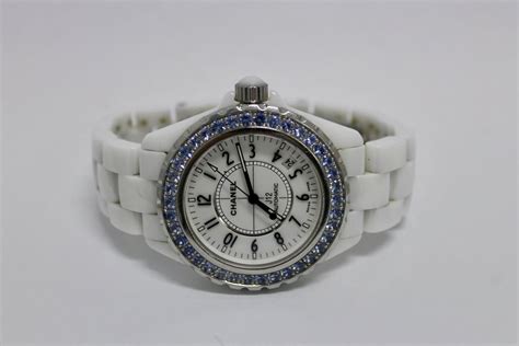 chanel j12 white ceramic blue sapphire bezel h1180|Chanel j12 automatic.